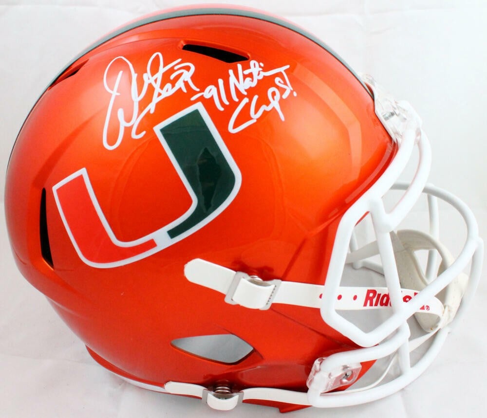 Miami Hurricanes football helmet signed by Warren Sapp BAS holo: Miami Hurricanes football helmet signed by Warren Sapp BAS holo This full-size Miami Hurricanes Flash Speed helmet features the autograph of Warren Sapp, a prominent football player. The helmet is an 