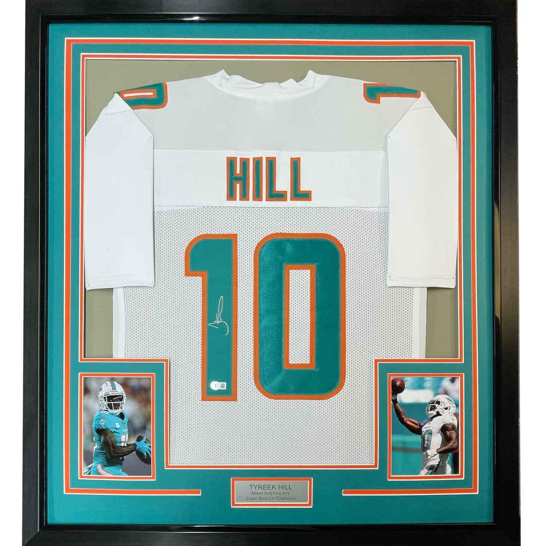 Framed Autographed Tyreek Hill Miami Dolphins Jersey BAS COA: Framed Autographed Tyreek Hill Miami Dolphins Jersey BAS COA This professionally framed and matted item features an autographed Tyreek Hill Miami Dolphins white football jersey. Measuring 35 inches by