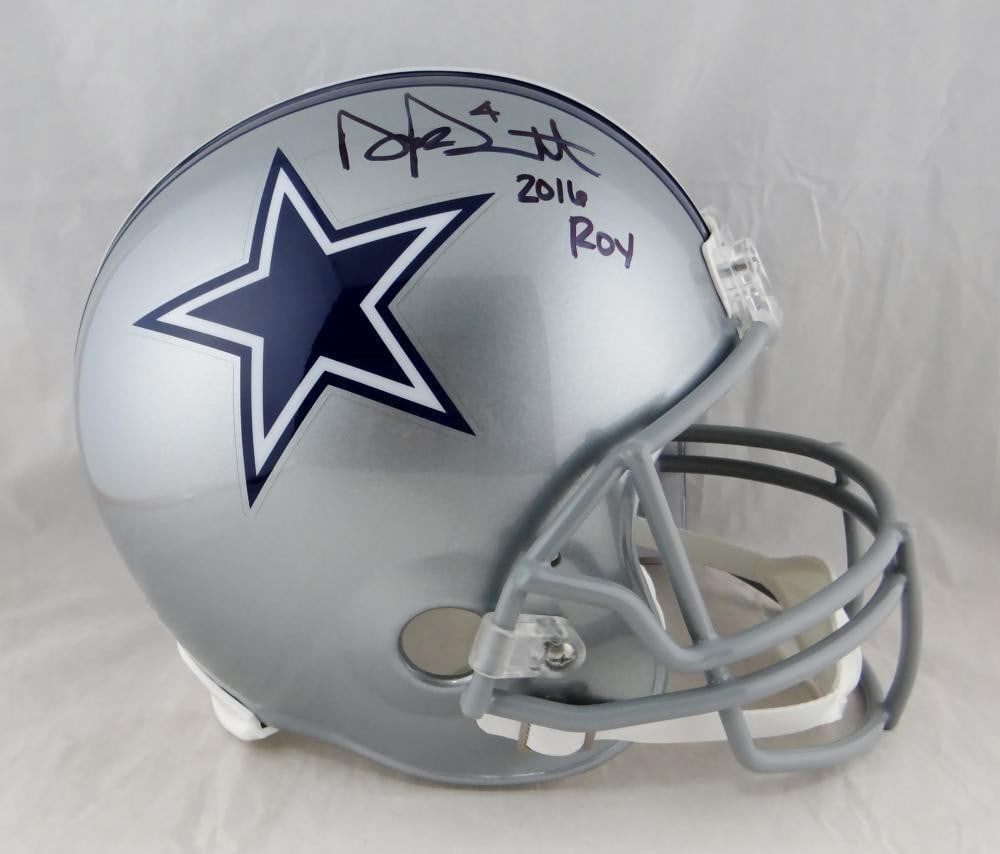Dak Prescott Signed Cowboys Full Size Helmet JSA Hologram: Dak Prescott Signed Cowboys Full Size Helmet JSA Hologram This full-size Dallas Cowboys helmet features an authentic autograph from Dak Prescott, the team's star quarterback. The helmet includes the "