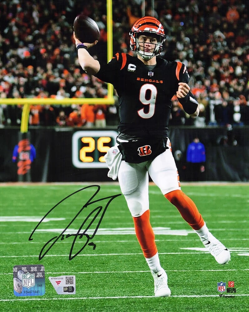Joe Burrow Signed Bengals Night Game 8x10 Photo with Fanatics COA: Joe Burrow Signed Bengals Night Game 8x10 Photo with Fanatics COA Capture the excitement of the NFL with this Joe Burrow signed Cincinnati Bengals black jersey night game 8x10 photo. This original pho