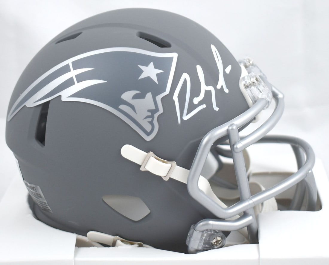 Randy Moss signed Patriots slate speed mini helmet BAS: Randy Moss signed Patriots slate speed mini helmet BAS This is a pre-owned New England Patriots Slate Speed mini helmet autographed by Randy Moss. The signature has been authenticated by Beckett Authe