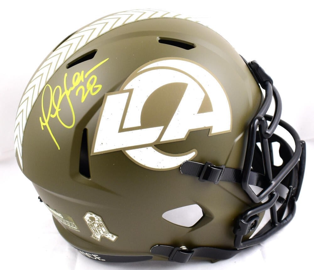 St Louis Rams Speed Helmet Signed by Marshall Faulk BAS Holo: St Louis Rams Speed Helmet Signed by Marshall Faulk BAS Holo This full-size St. Louis Rams Salute to Service Speed helmet features the authentic signature of Marshall Faulk. The helmet is original and
