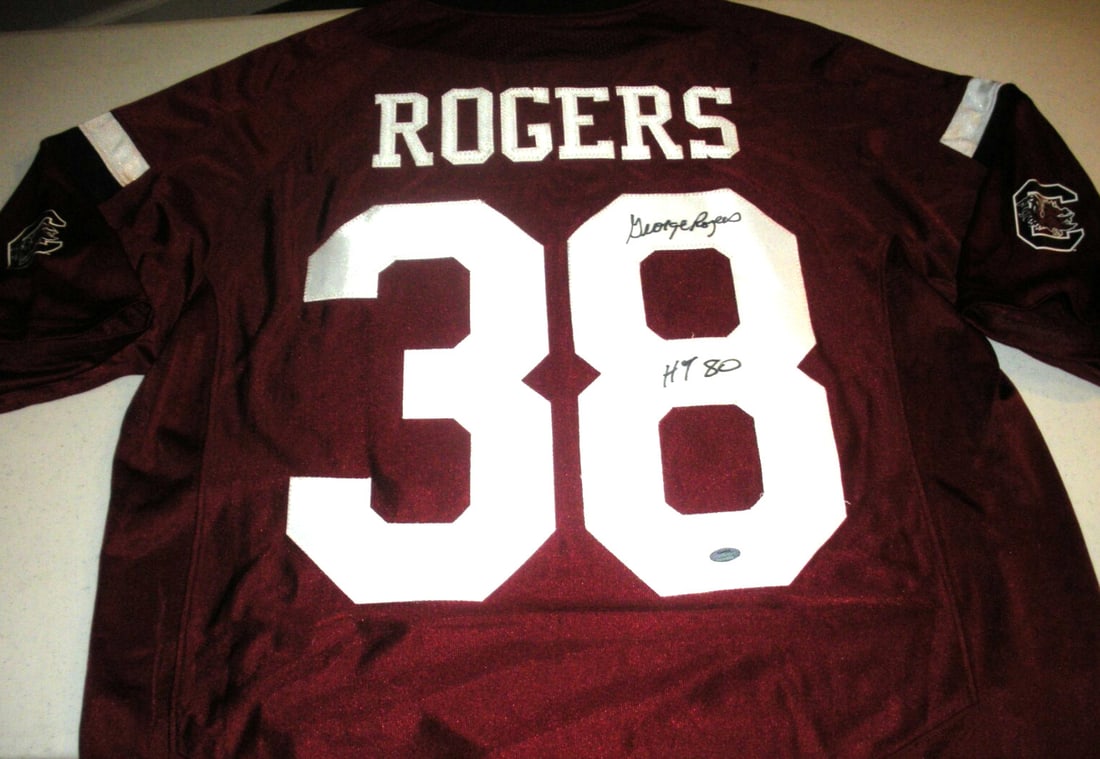 Signed Under Armour Jersey Autographed by George Rogers with COA: Signed Under Armour Jersey Autographed by George Rogers with COA This official licensed Under Armour jersey has been personally signed by George Rogers of the South Carolina Gamecocks. The jersey come