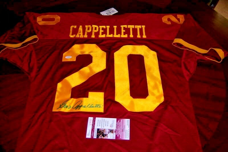 Signed Russell Jersey by Gino Cappelletti Minnesota Gophers JSA COA: Signed Russell Jersey by Gino Cappelletti Minnesota Gophers JSA COA This official Russell jersey is signed by Gino Cappelletti and represents the Minnesota Gophers. It is an original football jersey a