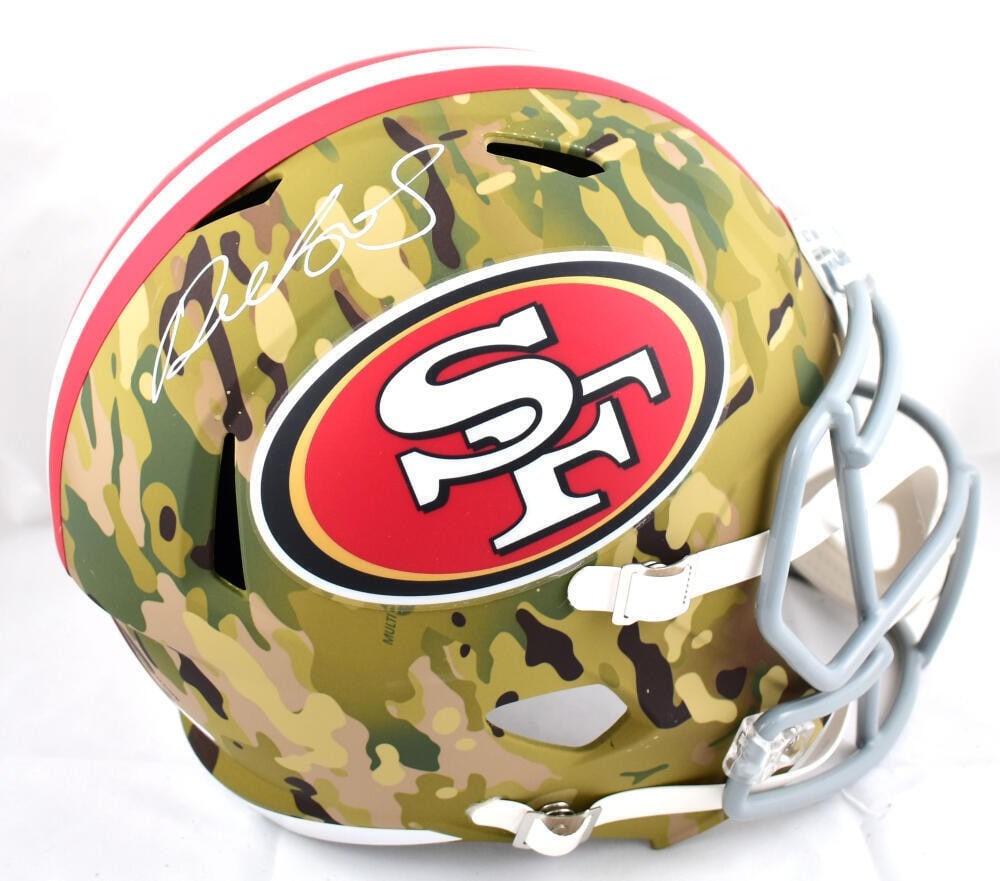 Deebo Samuel signed 49ers camo speed football helmet JSA: Deebo Samuel signed 49ers camo speed football helmet JSA This full-size camo Speed helmet features the autograph of Deebo Samuel of the San Francisco 49ers. The signature is authenticated by James Spe