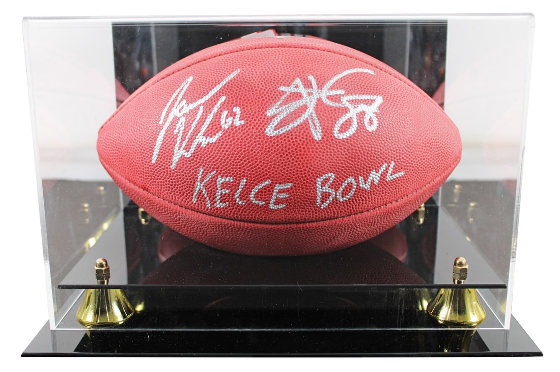 Travis Kelce Jason Kelce Signed Wilson Duke Football with Display Case BAS: Travis Kelce Jason Kelce Signed Wilson Duke Football with Display Case BAS Celebrate the epic "Kelce Bowl" with this autographed Official Wilson 2020 "The Duke" Football, personally signed by NFL star