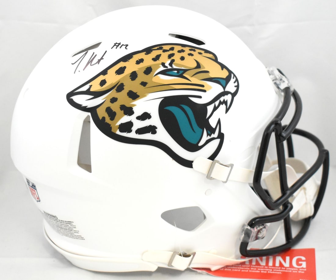 Jacksonville Jaguars Authentic Speed Helmet Signed by Travis Hunter Beckett Holo: Jacksonville Jaguars Authentic Speed Helmet Signed by Travis Hunter Beckett Holo This is a pre-owned Jacksonville Jaguars full-size alternate Speed Authentic helmet autographed by Travis Hunter. The h
