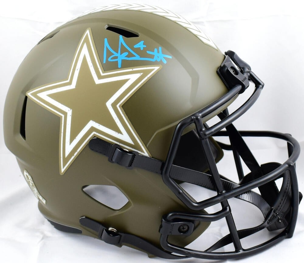 Dak Prescott Autographed Cowboys Salute to Service Helmet Beckett Authenticated: Dak Prescott Autographed Cowboys Salute to Service Helmet Beckett Authenticated This is an original football helmet signed by Dak Prescott, featuring the Dallas Cowboys' Salute to Service design. The 