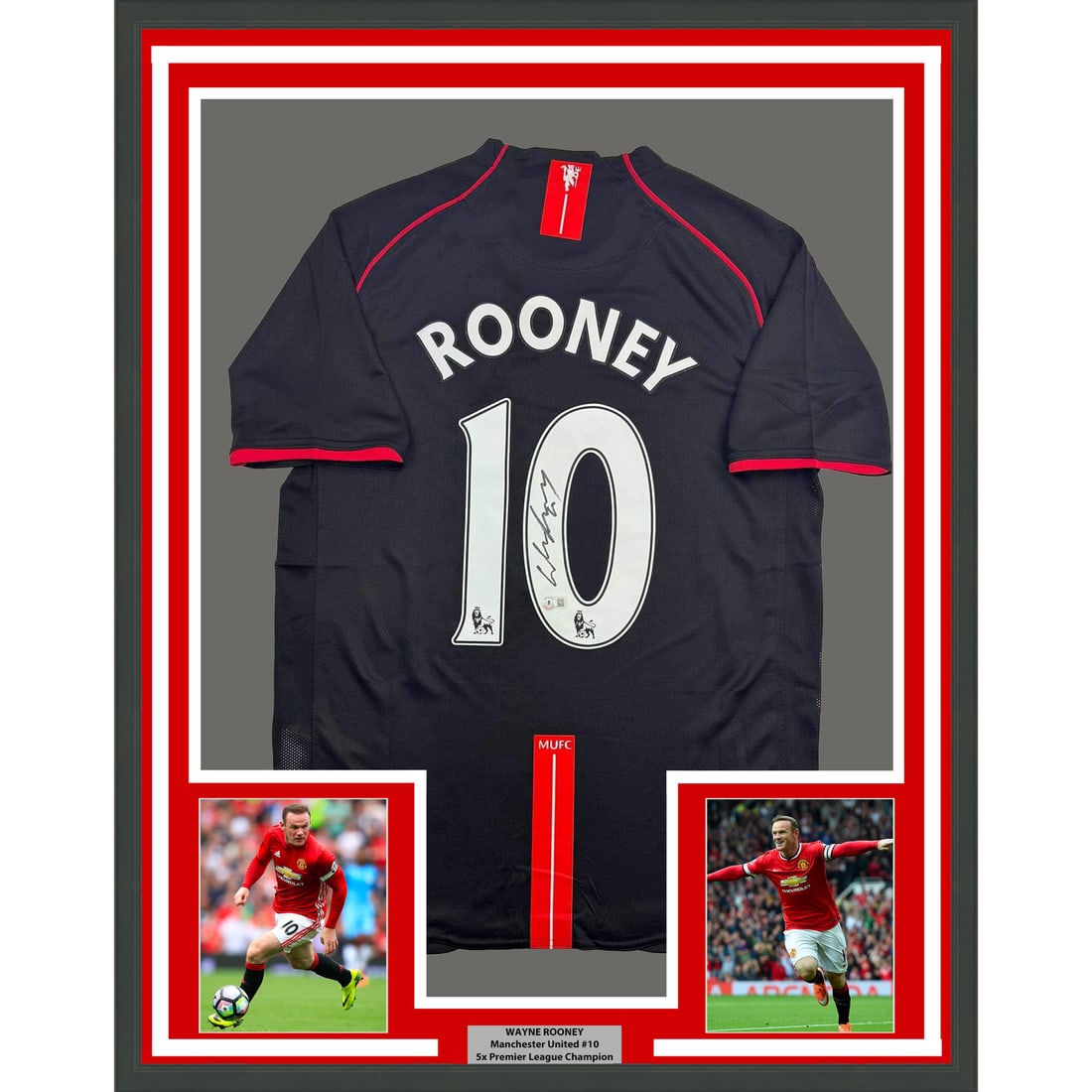 Wayne Rooney Signed Manchester United Jersey in Black Frame with BAS COA 35x39": Wayne Rooney Signed Manchester United Jersey in Black Frame with BAS COA 35x39" This is a professionally framed and matted Manchester United black jersey autographed by Wayne Rooney. The display inclu