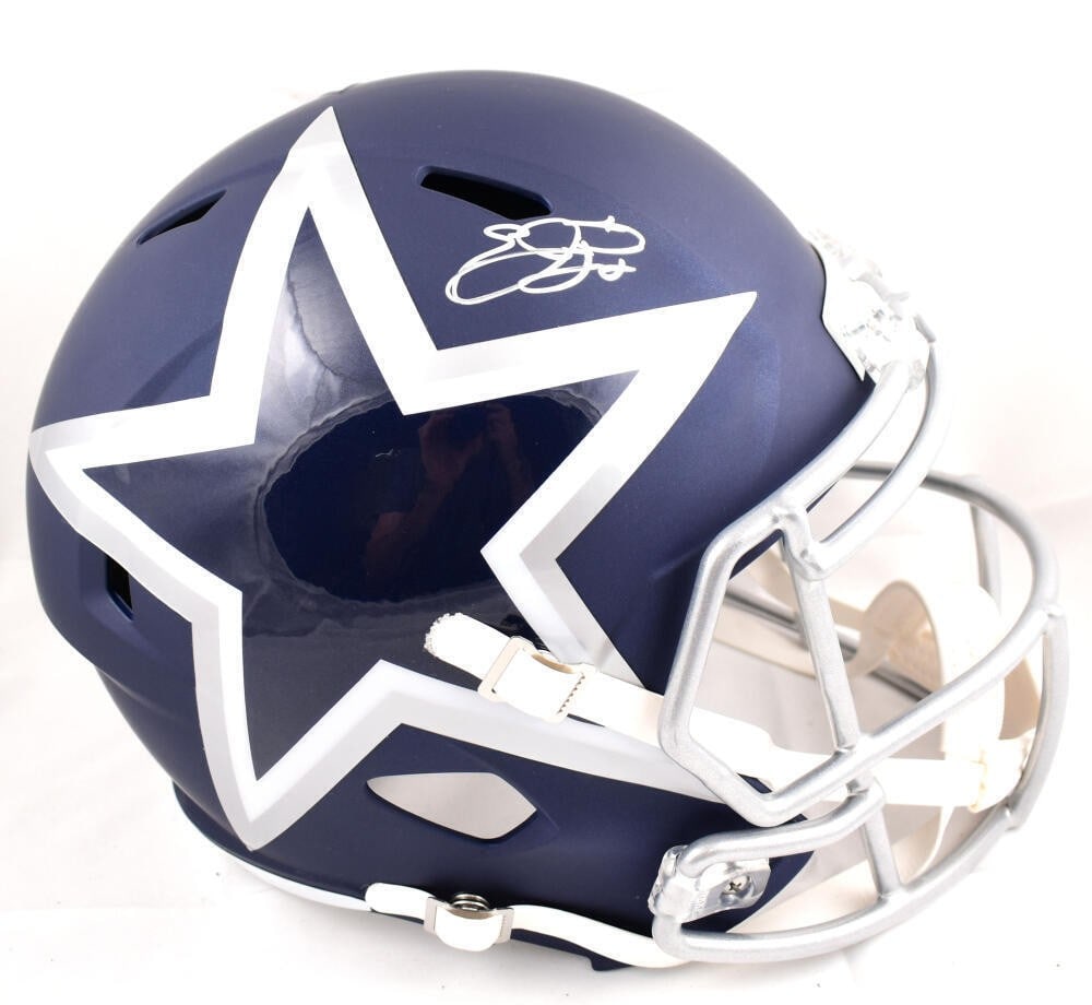 Dallas Cowboys AMP Speed Helmet Signed by Emmitt Smith Beckett Hologram: Dallas Cowboys AMP Speed Helmet Signed by Emmitt Smith Beckett Hologram This is a full-size Dallas Cowboys AMP Speed helmet autographed by Emmitt Smith. The signature has been authenticated by Beckett