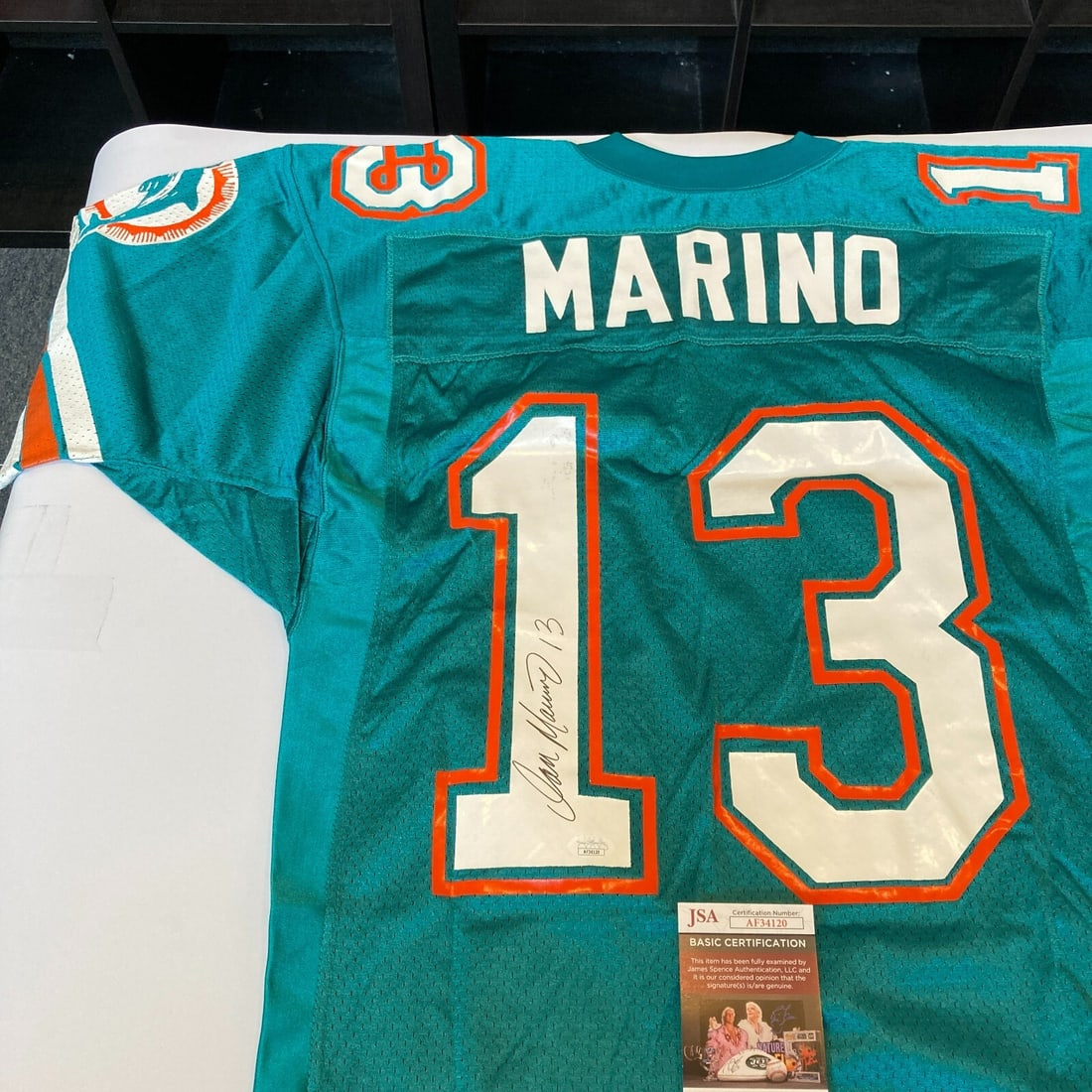 Dan Marino Signed Wilson Dolphins Game Jersey JSA Authenticated: Dan Marino Signed Wilson Dolphins Game Jersey JSA Authenticated Own a piece of football history with this authentic Wilson Miami Dolphins game model jersey signed by legendary quarterback Dan Marino. 