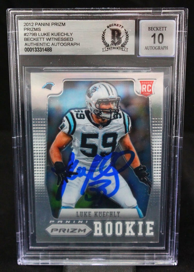 Luke Kuechly Auto Silver Prizm Football Card 2012 BGS 10 Panthers Rookie: Luke Kuechly Auto Silver Prizm Football Card 2012 BGS 10 Panthers Rookie This is a 2012 Panini Prizm Silver #279 sports trading card featuring Luke Kuechly of the Carolina Panthers. The card showcases