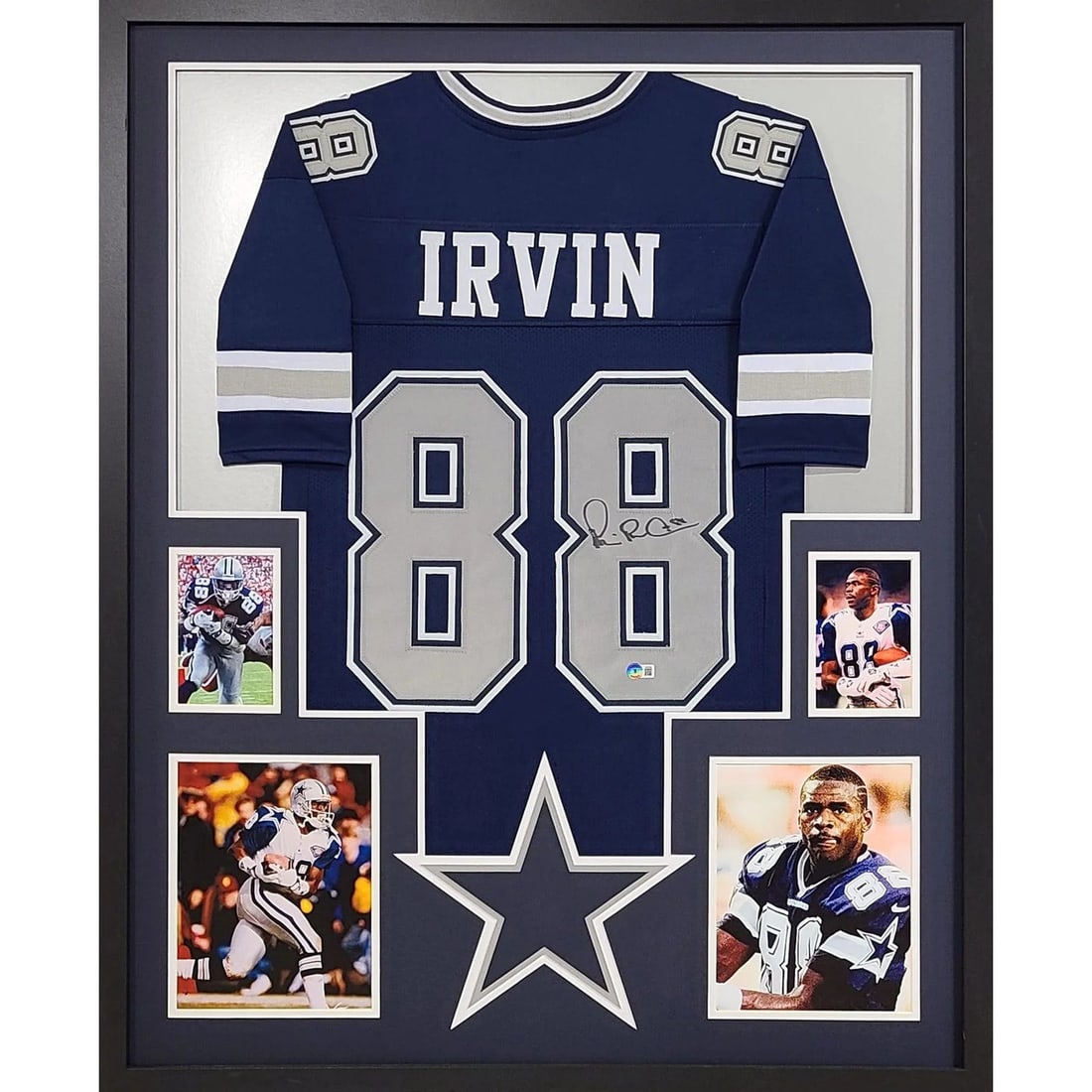 Beckett Autographed Michael Irvin Cowboys Framed Jersey 42x34: Beckett Autographed Michael Irvin Cowboys Framed Jersey 42x34 This is a framed Dallas Cowboys jersey autographed by Michael Irvin. The jersey is authenticated by Beckett and includes a tamper-proof st