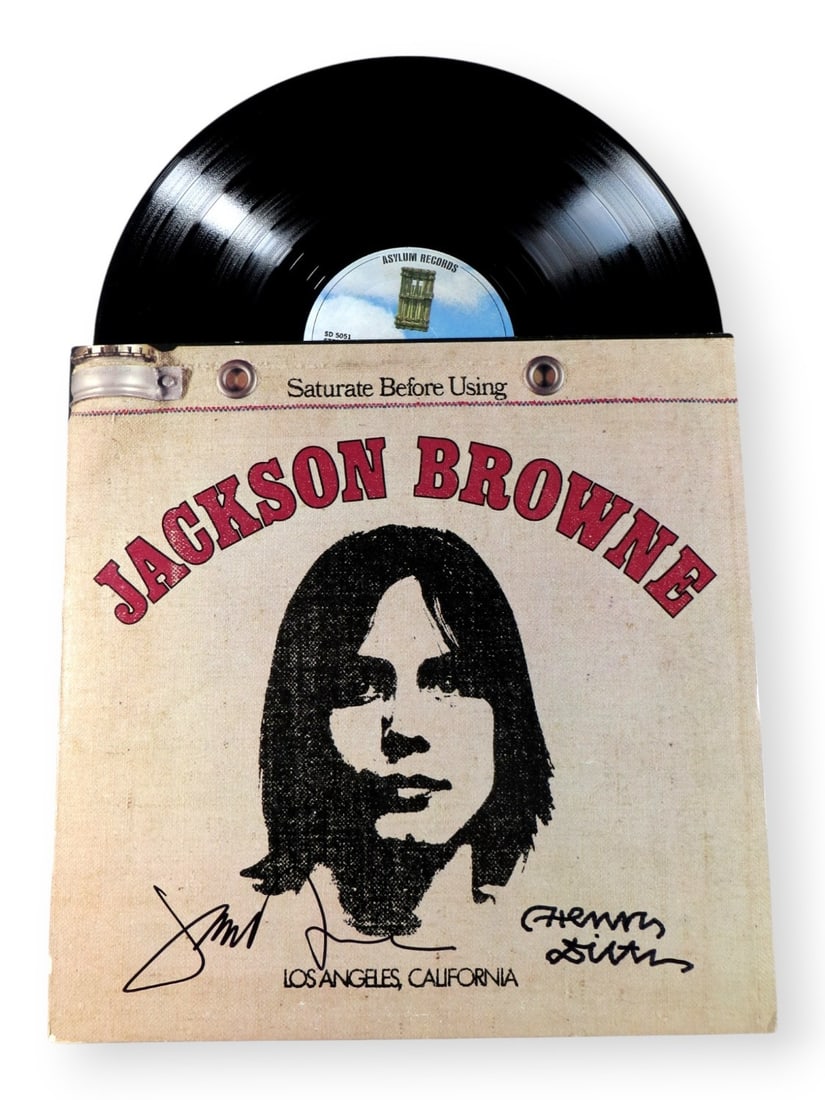 Autographed Album Cover Signed by Jackson Browne and Henry Diltz Beckett Authenticated: Autographed Album Cover Signed by Jackson Browne and Henry Diltz Beckett Authenticated This is an original album cover autographed by both Jackson Browne and Henry Diltz. The signatures have been auth