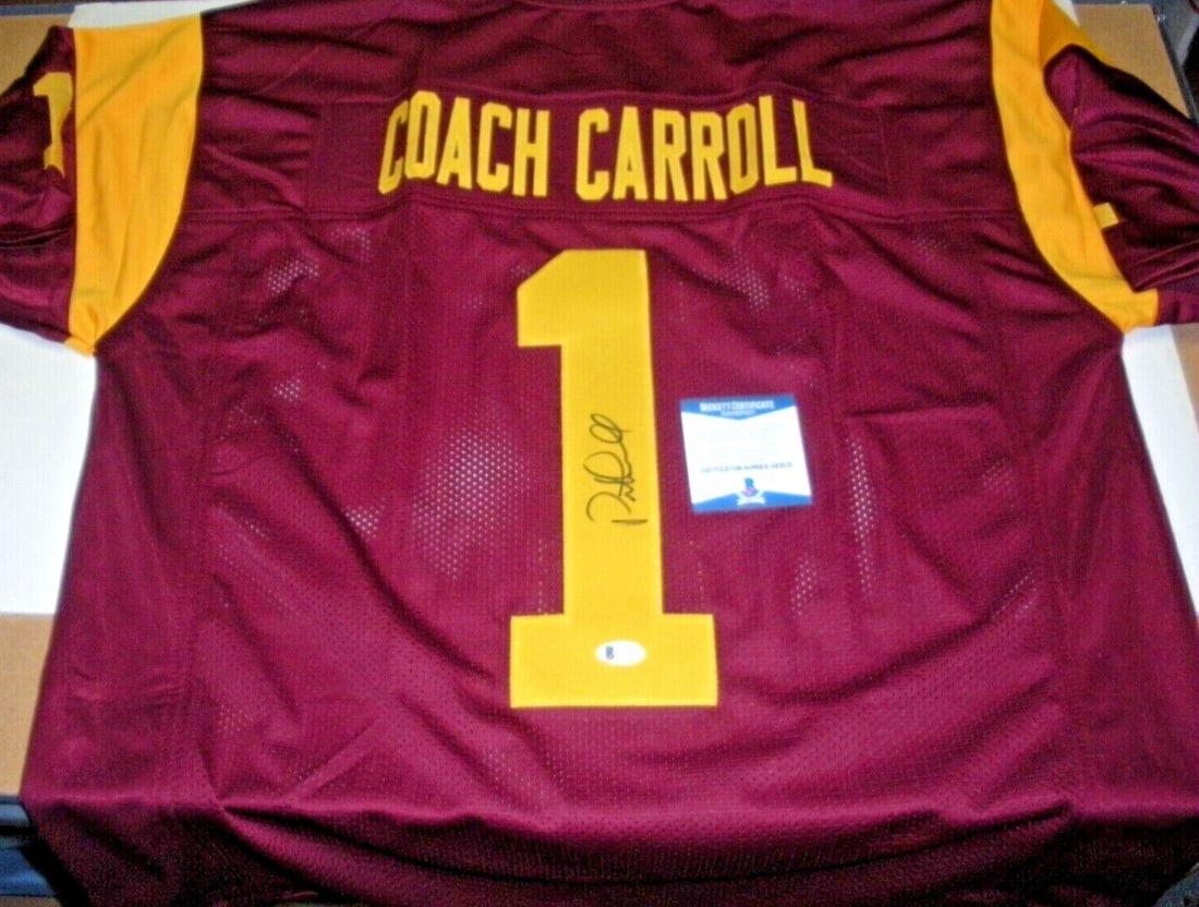Pete Carroll Autographed USC Trojans Jersey With Beckett COA 2005 Champions: Pete Carroll Autographed USC Trojans Jersey With Beckett COA 2005 Champions This pre-owned jersey celebrates the USC Trojans' 2005 National Championship and features a signature from Pete Carroll. It 