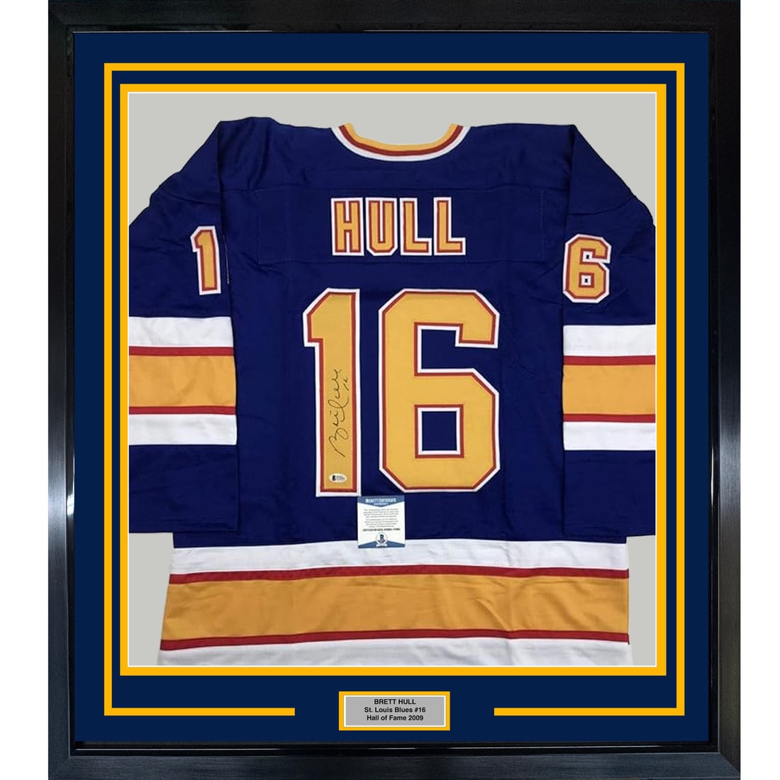 Framed Brett Hull Signed Jersey 35x39 St. Louis Blues Beckett COA: Framed Brett Hull Signed Jersey 35x39 St. Louis Blues Beckett COA Celebrate the legacy of NHL star Brett Hull with this professionally framed and matted autographed St. Louis Blues jersey. This unique