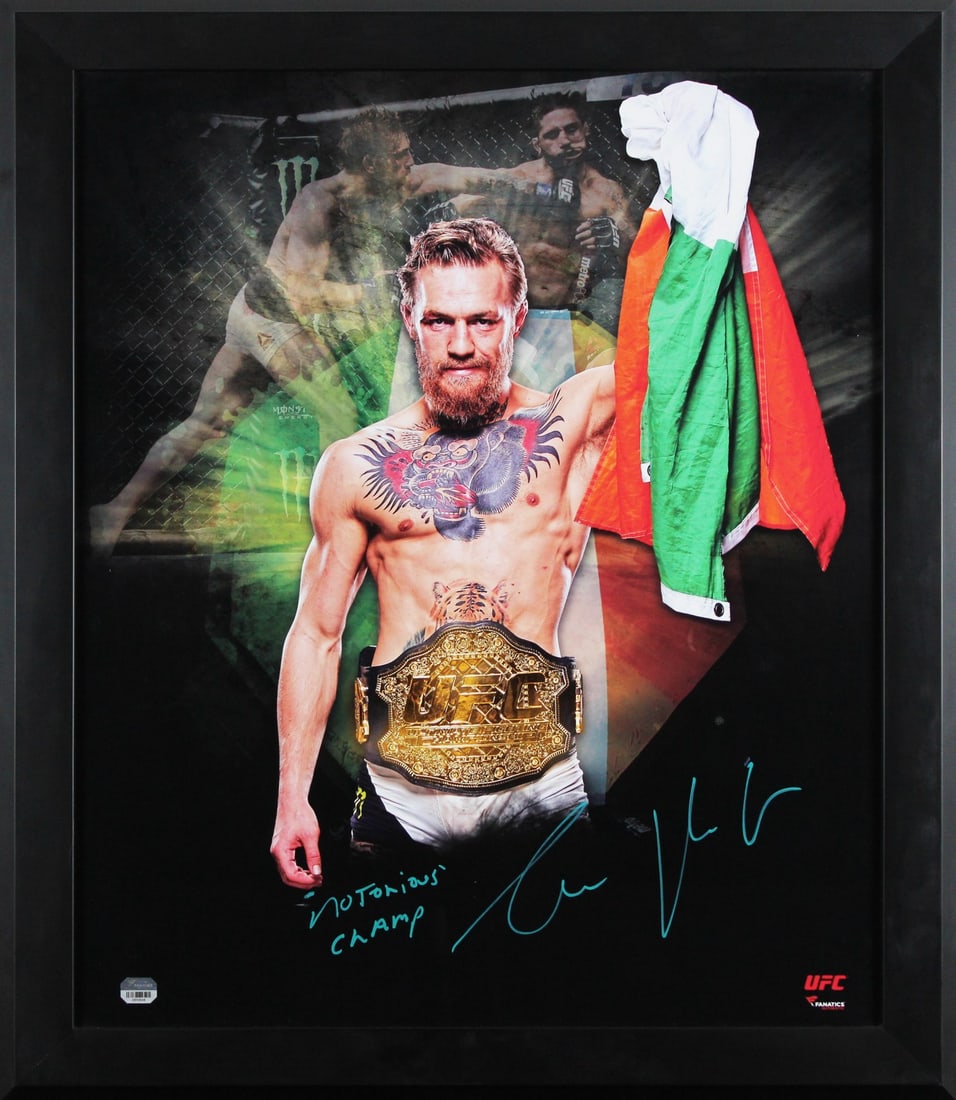 Framed 20x24 Conor McGregor signed photo Fanatics hologram: Framed 20x24 Conor McGregor signed photo Fanatics hologram This framed 20x24 photo features an authentic autograph by Conor McGregor. The signature has been personally signed and comes with a numbered