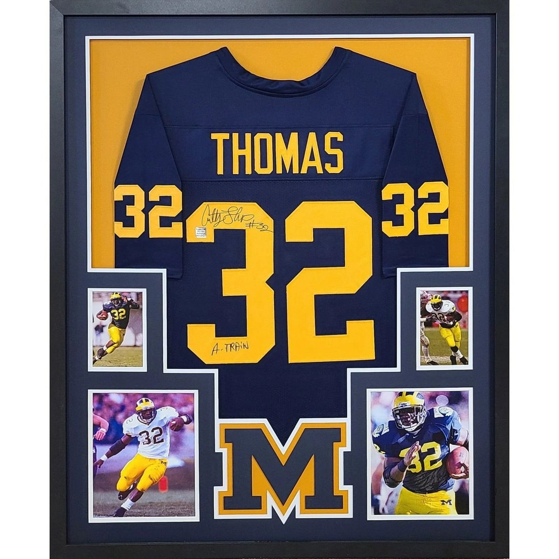 Anthony Thomas Autographed Framed Jersey Playball Ink COA Michigan: Anthony Thomas Autographed Framed Jersey Playball Ink COA Michigan This autographed framed jersey features Anthony Thomas, a celebrated player from Michigan. Authenticated by Playball Ink, it includes