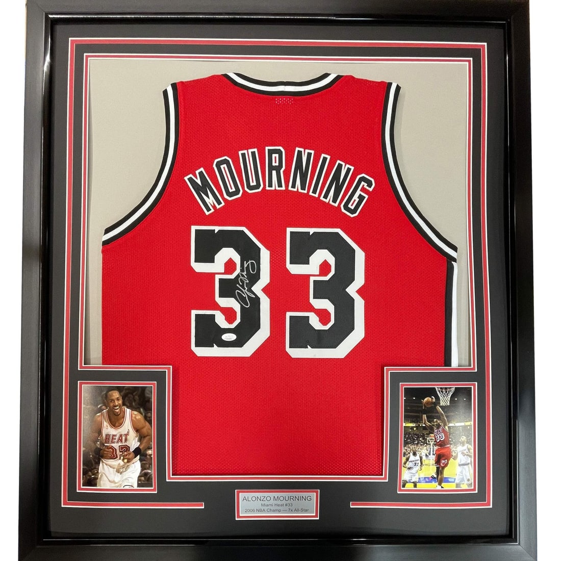 Framed Alonzo Mourning Signed Miami Heat Jersey with JSA COA: Framed Alonzo Mourning Signed Miami Heat Jersey with JSA COA This professionally framed and matted collectible showcases an autographed Alonzo Mourning Miami Heat jersey, accompanied by two 5x7 photos