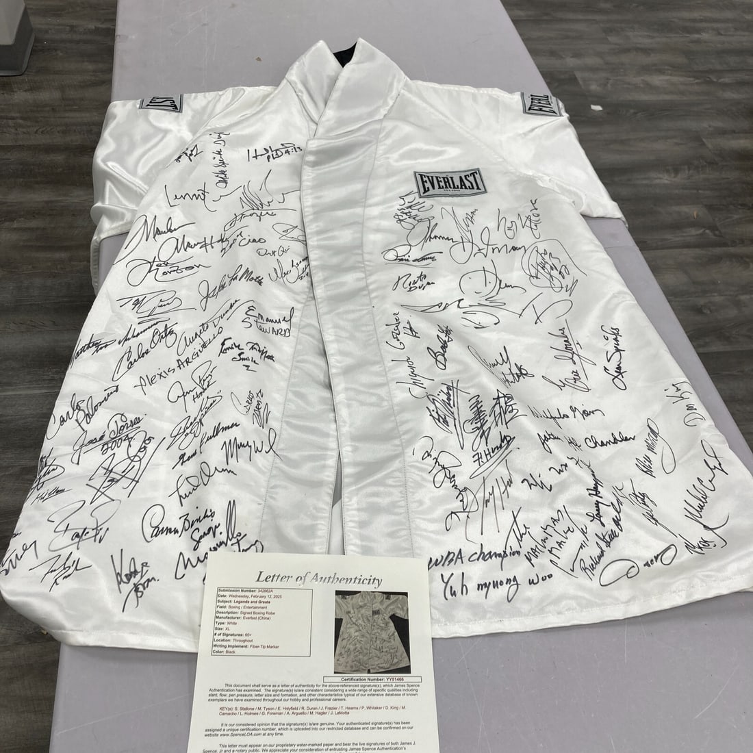 Boxing Hall of Fame Signed Everlast Robe 60+ Signatures JSA Authenticated: Boxing Hall of Fame Signed Everlast Robe 60+ Signatures JSA Authenticated This exceptional Boxing Hall of Fame Legends Everlast robe features over 60 signatures from the most iconic figures in boxing 