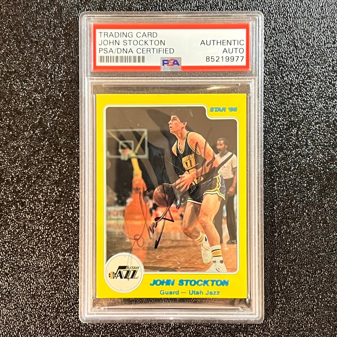 1984 Star John Stockton Signed Card PSA Slabbed Utah Jazz Licensed Reprint: 1984 Star John Stockton Signed Card PSA Slabbed Utah Jazz Licensed Reprint This is a 1984 Star #144 trading card featuring the legendary John Stockton, known for his remarkable career with the Utah Ja