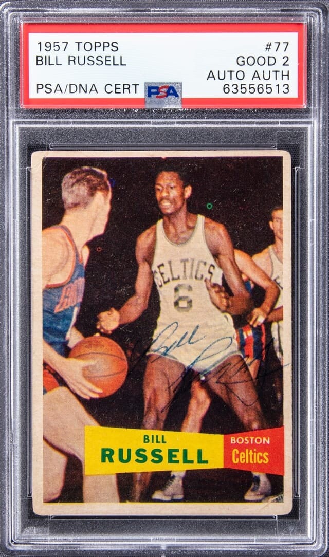 1957 Topps Bill Russell Signed Rookie Card PSA DNA Authenticated: 1957 Topps Bill Russell Signed Rookie Card PSA DNA Authenticated This is a 1957 Topps #77 Bill Russell Rookie Card, a significant piece in the world of sports trading cards. This original card feature
