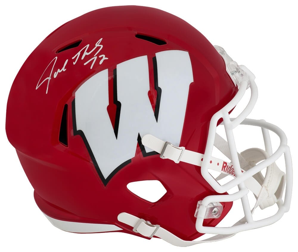 Wisconsin Badgers Full Size Flash Helmet Signed by Joe Thomas with COA: Wisconsin Badgers Full Size Flash Helmet Signed by Joe Thomas with COA This is a pre-owned Wisconsin Badgers Flash Riddell full size speed replica helmet signed by Joe Thomas. The helmet includes a ta