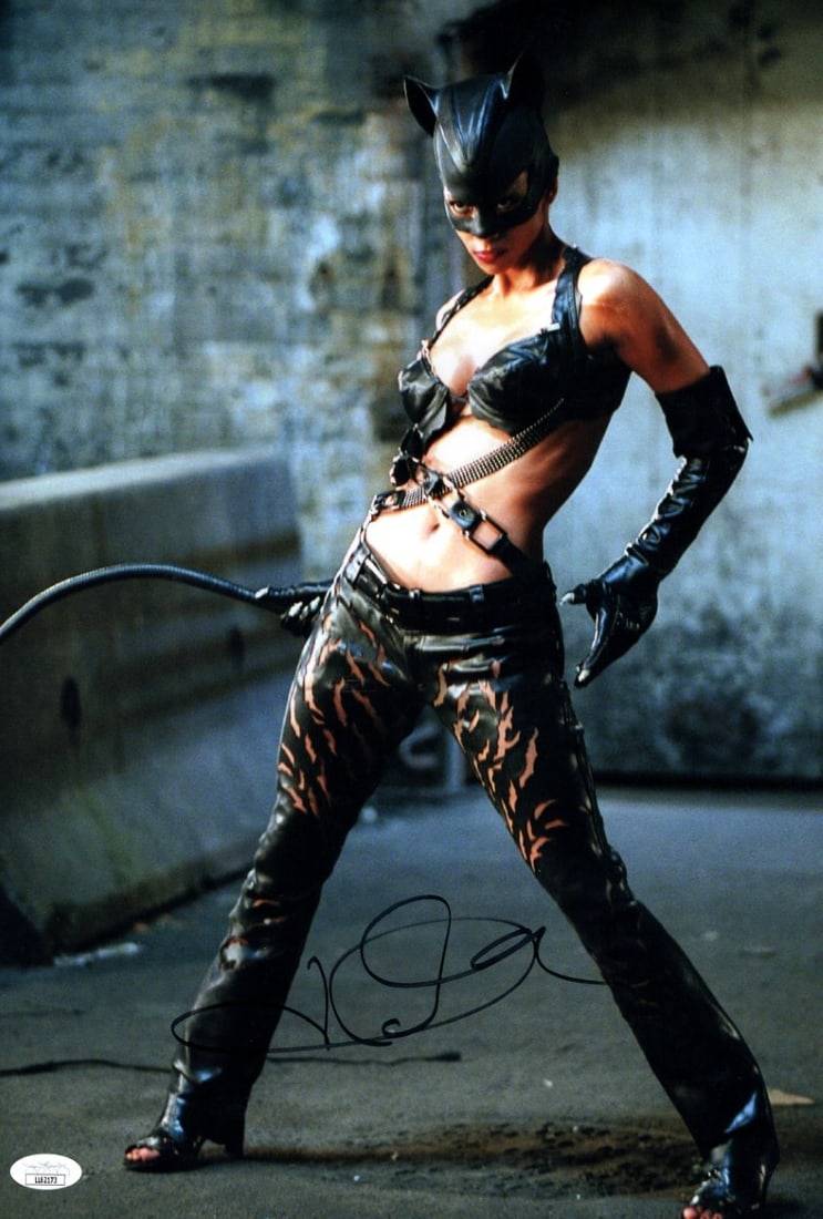 Halle Berry Autographed Catwoman 12x18 Photo JSA Certified: Halle Berry Autographed Catwoman 12x18 Photo JSA Certified This stunning 12X18 photograph features Halle Berry as Catwoman, beautifully autographed by the actress herself. The authenticity of the sign