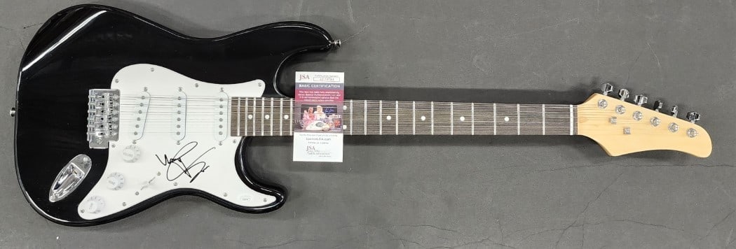 Yelawolf Autographed Electric Guitar Authenticated by JSA: Yelawolf Autographed Electric Guitar Authenticated by JSA This electric guitar is personally autographed by Yelawolf, making it a unique collector's item for fans of the artist. The autograph comes wi