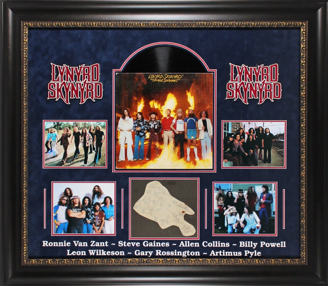 Lynyrd Skynyrd Signed Framed Display with JSA COA 7 Signatures: Lynyrd Skynyrd Signed Framed Display with JSA COA 7 Signatures This stunning framed display features the authentic signatures of legendary Lynyrd Skynyrd members, including Ronnie Van Zant, Allen Coll