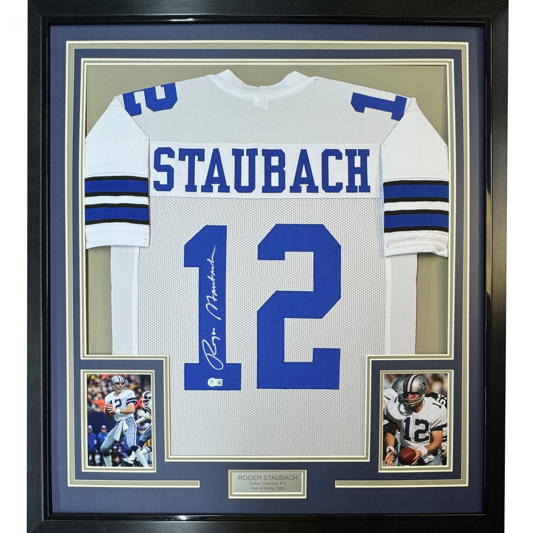 Roger Staubach Dallas Cowboys Signed Jersey Display 35x39 Framed with Beckett COA: Roger Staubach Dallas Cowboys Signed Jersey Display 35x39 Framed with Beckett COA This professionally framed and matted display features a Dallas Cowboys white jersey autographed by Roger Staubach. Th