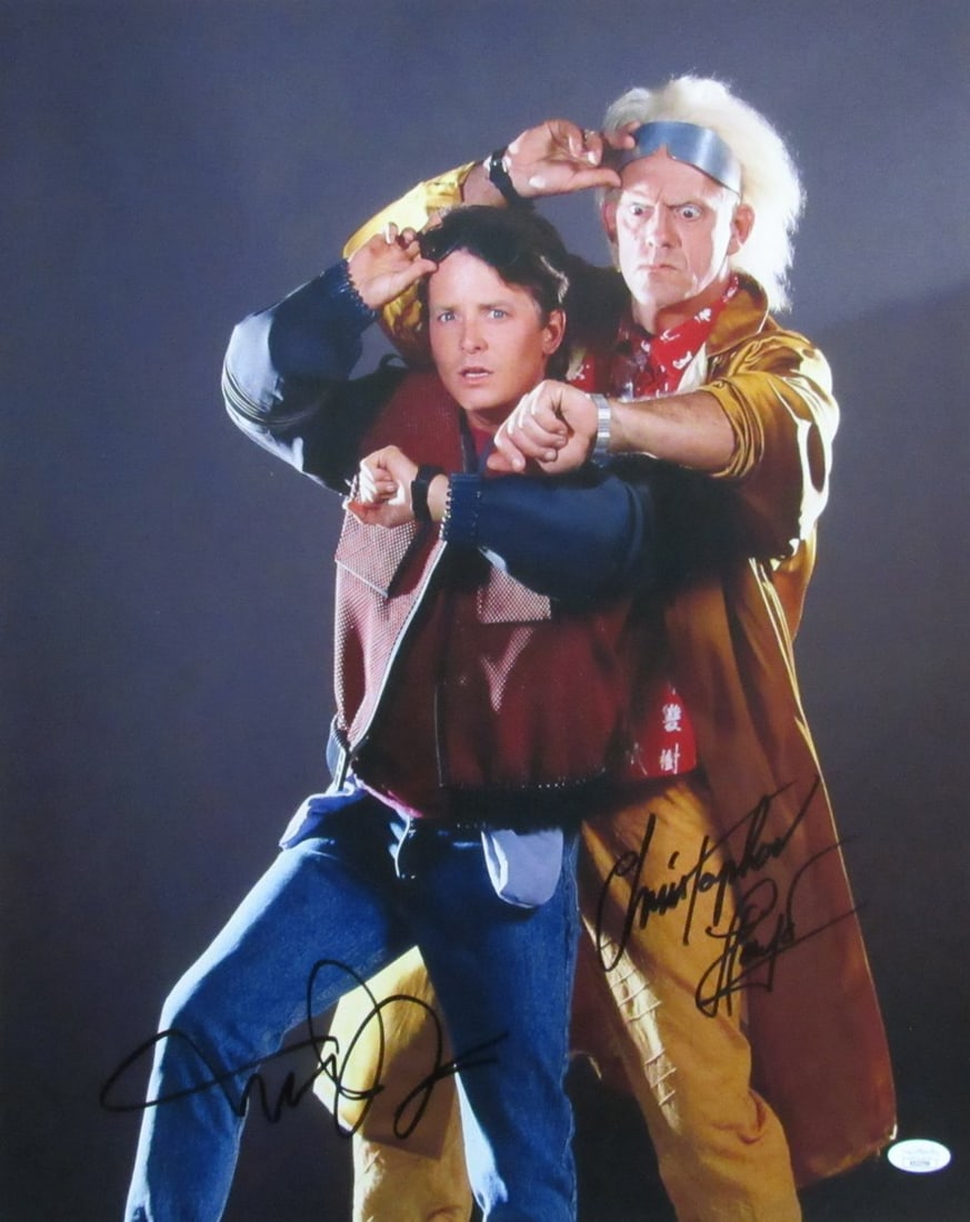 Michael J Fox Christopher Lloyd Autographed 16x20 Photo Back to the Future JSA Certified: Michael J Fox Christopher Lloyd Autographed 16x20 Photo Back to the Future JSA Certified This stunning 16x20 photograph features the iconic duo from "Back to the Future," Michael J. Fox and Christophe