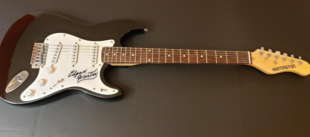 Edgar Winter Autographed Electric Guitar Beckett Certified Rock Legend: Edgar Winter Autographed Electric Guitar Beckett Certified Rock Legend This authentic electric guitar is hand-signed by rock legend Edgar Winter, making it a must-have for collectors and fans alike. T