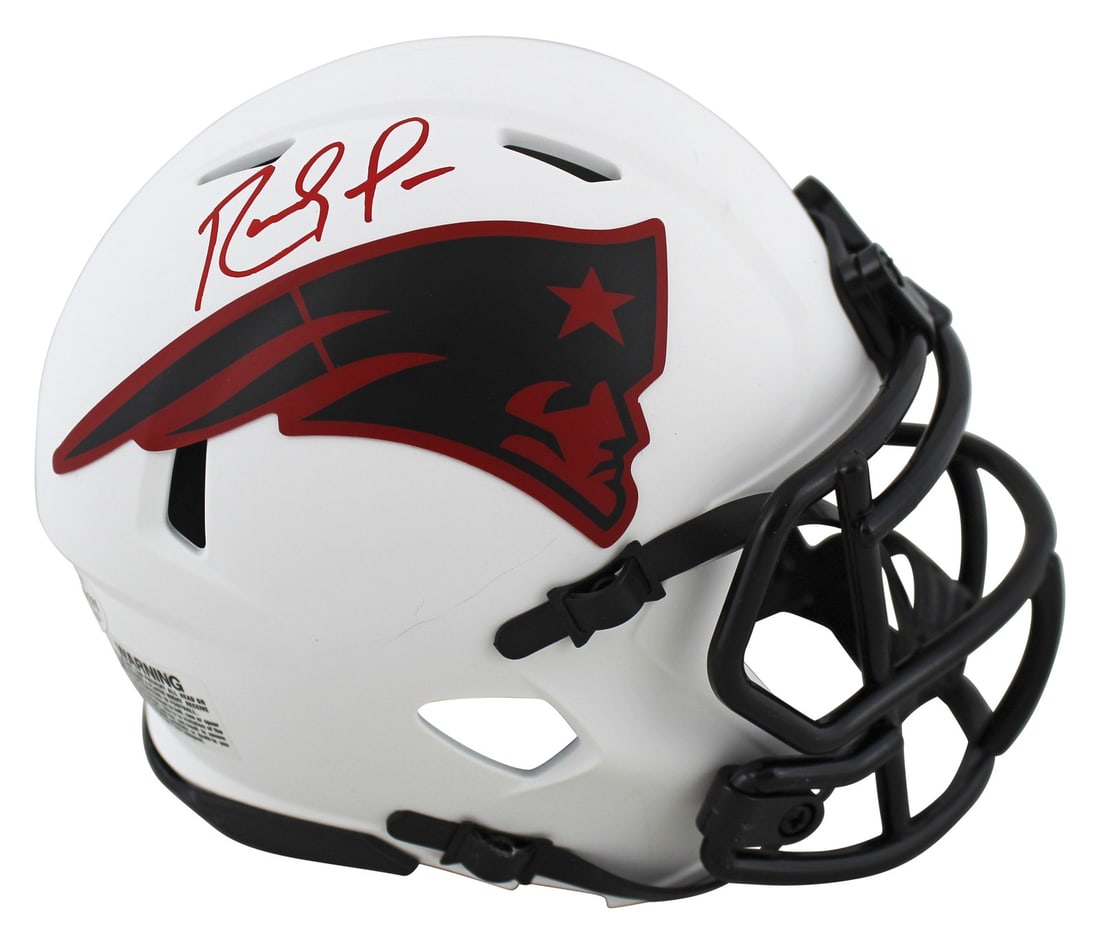 Randy Moss Autographed Lunar Speed Mini Helmet Beckett Witness New England Patriots: Randy Moss Autographed Lunar Speed Mini Helmet Beckett Witness New England Patriots This authentic New England Patriots Lunar Speed mini helmet features the personal signature of Randy Moss. The autog