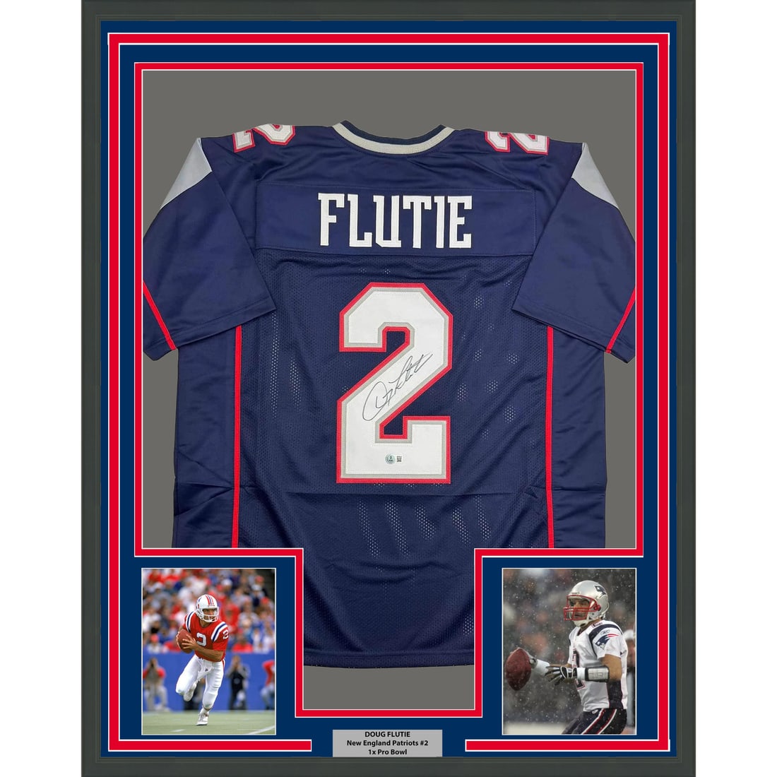 Doug Flutie Signed Patriots Jersey 35x39 Framed With Beckett COA: Doug Flutie Signed Patriots Jersey 35x39 Framed With Beckett COA This framed display features a blue New England Patriots jersey hand-signed by Doug Flutie. The jersey is professionally framed and mat