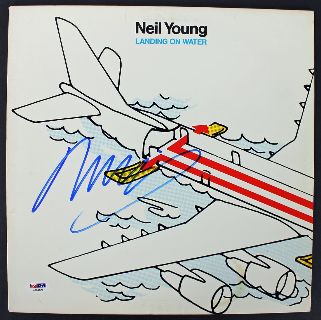 Neil Young Signed Landing On Water Album Cover PSA/DNA #AA84129: Neil Young Signed Landing On Water Album Cover PSA/DNA #AA84129 This authentic signed album cover features the iconic artwork from Neil Young's 'Landing On Water'. Personally autographed by Neil Young