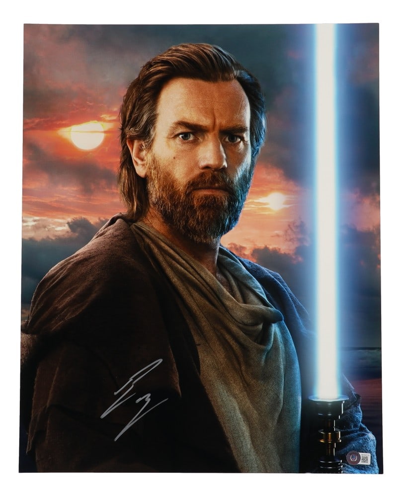 Ewan McGregor Signed 16x20 Obi-Wan Photo Beckett Authenticated: Ewan McGregor Signed 16x20 Obi-Wan Photo Beckett Authenticated This stunning 16x20 photograph features Ewan McGregor, renowned for his portrayal of "Obi-Wan" in the Star Wars saga. The photo is an ori