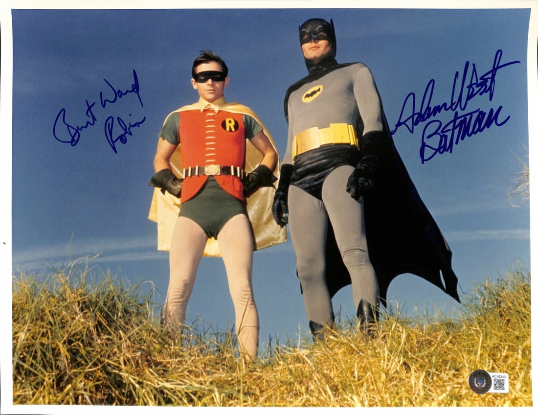 Adam West Burt Ward Signed 11x14 Batman Robin Photo Beckett Authenticated: Adam West Burt Ward Signed 11x14 Batman Robin Photo Beckett Authenticated This iconic 11x14 color photograph features Adam West and Burt Ward, the stars of the classic 1960s Batman TV series. Hand-sig