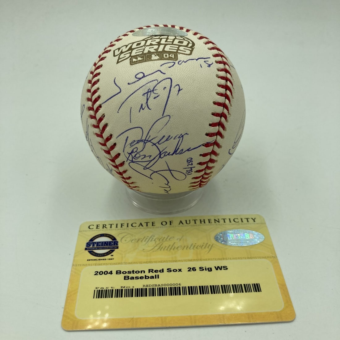 2004 Boston Red Sox Team Signed Baseball with Steiner COA: 2004 Boston Red Sox Team Signed Baseball with Steiner COA Celebrate the historic achievement of the 2004 Boston Red Sox with this team-signed official World Series baseball. This unique collectible fe