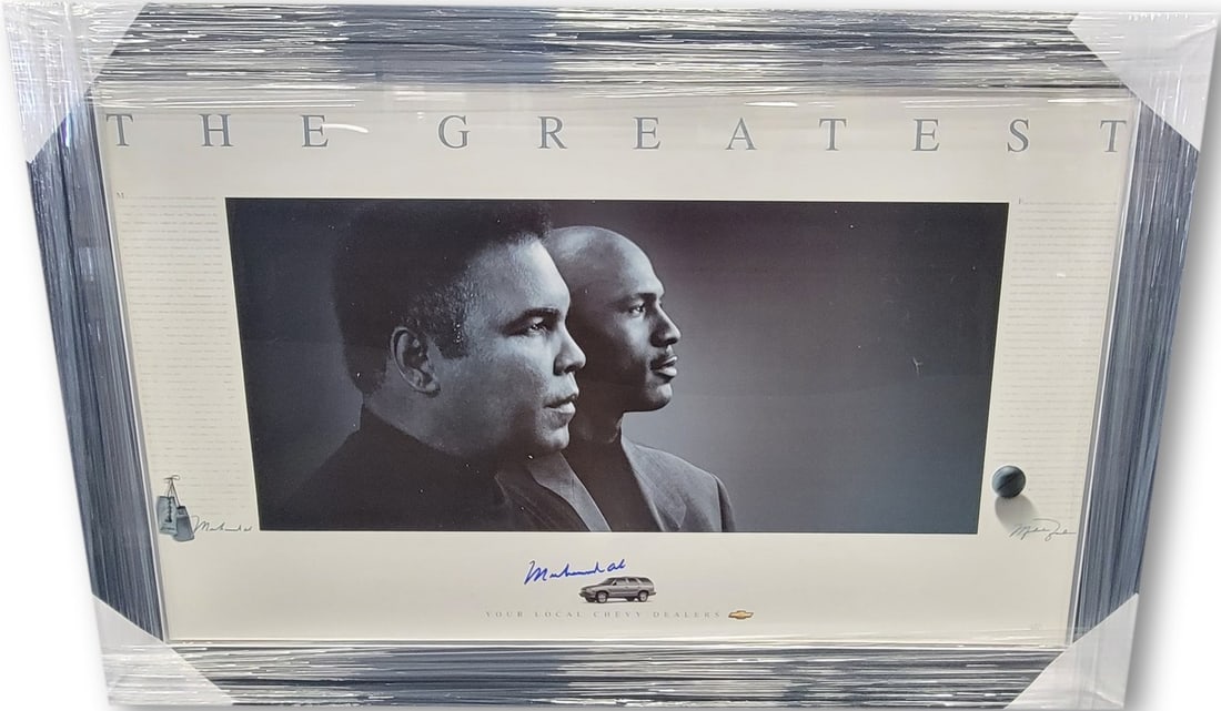 Muhammad Ali Signed Framed Poster The Greatest with Michael Jordan JSA Authenticated: Muhammad Ali Signed Framed Poster The Greatest with Michael Jordan JSA Authenticated This striking framed poster celebrates the legendary Muhammad Ali, featuring his autograph alongside the iconic Mic