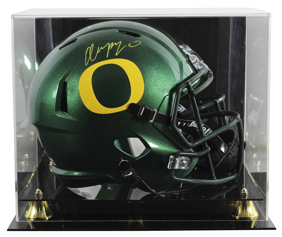 Christian Gonzalez Oregon Ducks Signed Full Size Speed Helmet with Beckett Authentication: Christian Gonzalez Oregon Ducks Signed Full Size Speed Helmet with Beckett Authentication This authentic, full-size Riddell Speed Rep Helmet has been personally signed by Christian Gonzalez of the Ore