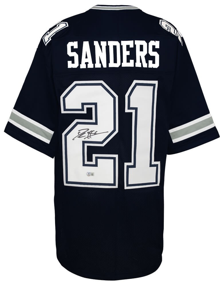 Deion Sanders Signed Dallas Cowboys Navy Throwback Jersey Beckett COA: Deion Sanders Signed Dallas Cowboys Navy Throwback Jersey Beckett COA This is a Deion Sanders signed navy throwback custom football jersey from his time with the Dallas Cowboys. The jersey features th