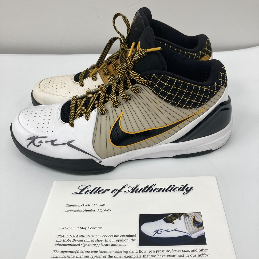 Kobe Bryant 2009 Dual Signed Game Used Nike Kobe IV Sneakers PSA LOA: Kobe Bryant 2009 Dual Signed Game Used Nike Kobe IV Sneakers PSA LOA Own a piece of basketball history with these Kobe Bryant 2009 Dual Signed Game Used Kobe IV PE Sneakers. These Nike mid-top sneaker