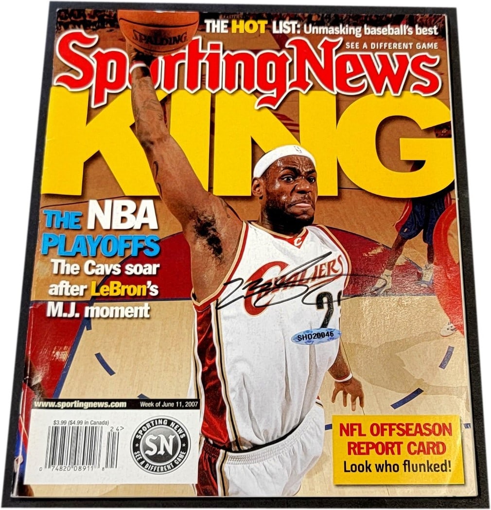 LeBron James Signed Sporting News Magazine Cavs June 2007 Upper Deck Authenticated: LeBron James Signed Sporting News Magazine Cavs June 2007 Upper Deck Authenticated This collectible magazine features LeBron James on the cover, celebrating his impact on the Cleveland Cavaliers. This