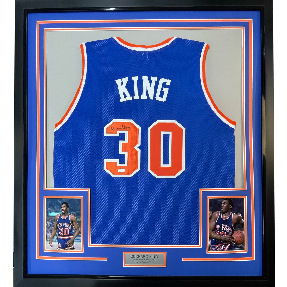 Bernard King Framed Knicks Blue Jersey Beckett COA 33x42: Bernard King Framed Knicks Blue Jersey Beckett COA 33x42 This professionally framed and matted New York Knicks blue jersey features the authentic autograph of Bernard King. The display includes two 8x