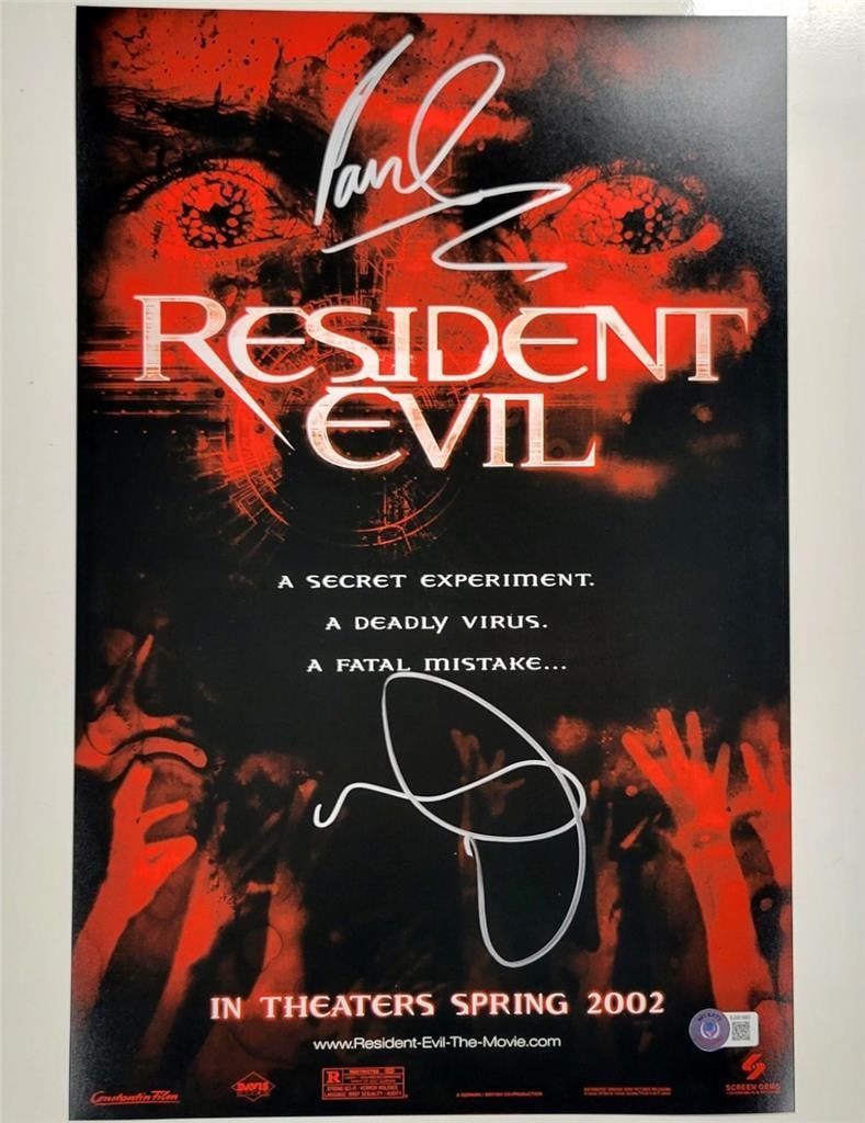 Milla Jovovich Signed Resident Evil 12x18 Photo Authenticated by Beckett: Milla Jovovich Signed Resident Evil 12x18 Photo Authenticated by Beckett This original 12x18 photograph from the iconic movie Resident Evil features the signatures of Milla Jovovich and Paul W.S. Ande