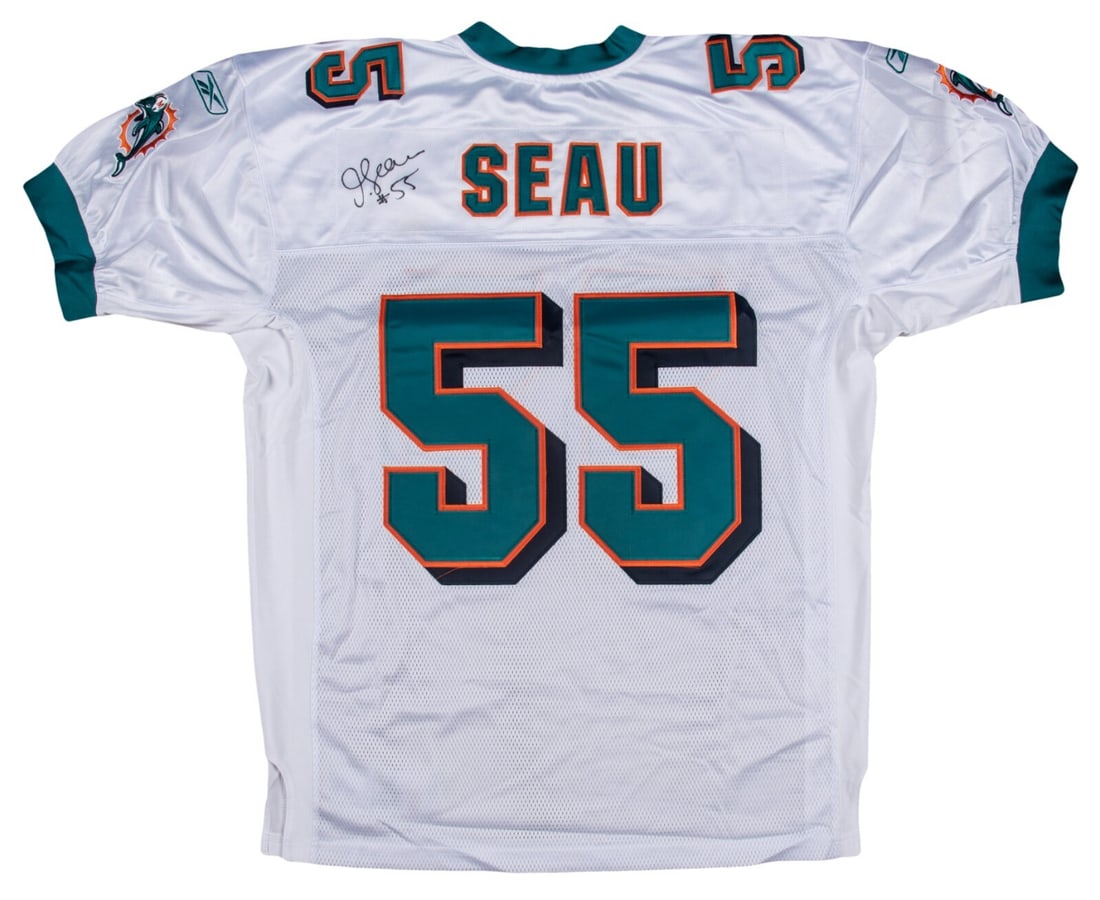 Junior Seau Signed Miami Dolphins Jersey Size 48 with JSA LOA: Junior Seau Signed Miami Dolphins Jersey Size 48 with JSA LOA Celebrate the legacy of Hall of Fame linebacker Junior Seau with this authentic Miami Dolphins jersey. Crafted by Reebok, this white jerse