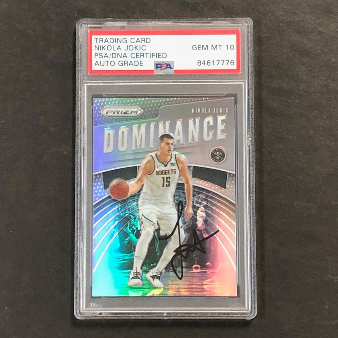 Nikola Jokic Autographed 2019-20 Prizm Dominance Silver Card PSA Authenticated: Nikola Jokic Autographed 2019-20 Prizm Dominance Silver Card PSA Authenticated This 2019-20 Panini Prizm Dominance Silver #21 trading card features Nikola Jokic of the Denver Nuggets. The card has bee