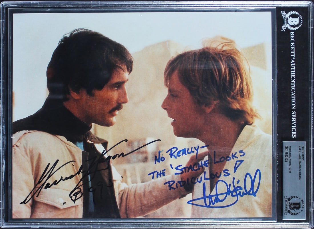Beckett slabbed 8x10 Star Wars A New Hope photo signed by Hamill Hagon: Beckett slabbed 8x10 Star Wars A New Hope photo signed by Hamill Hagon This 8x10 photograph from Star Wars: A New Hope has been personally signed by Mark Hamill and Garrick Hagon. The photo features t