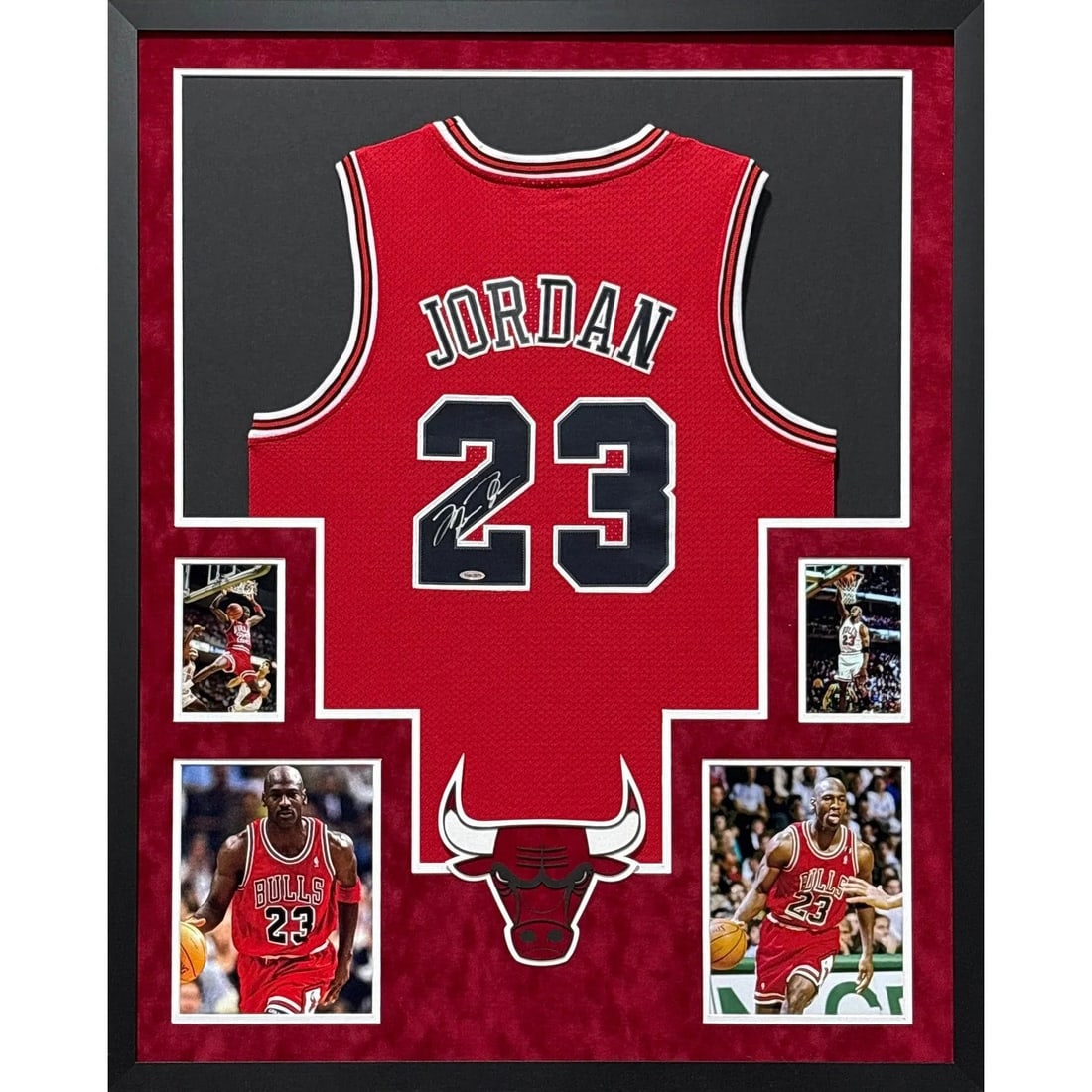 Framed Chicago Bulls Jersey Signed by Michael Jordan UDA Authenticated: Framed Chicago Bulls Jersey Signed by Michael Jordan UDA Authenticated This is a framed Chicago Bulls red jersey autographed by Michael Jordan. The jersey is authenticated by Upper Deck Authenticated 